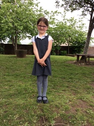 grey pinafore and grey tights